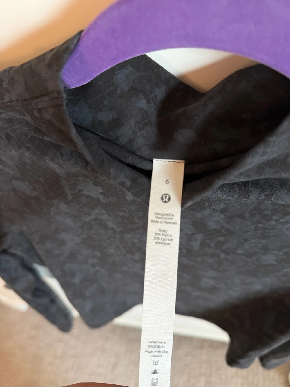 Lululemon Nulu Mock Neck Long Sleeve in Black with Dark Gray Marble Pattern